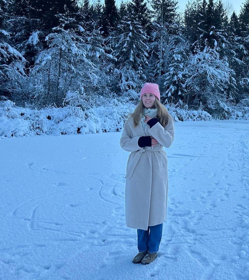 woman standing in snow